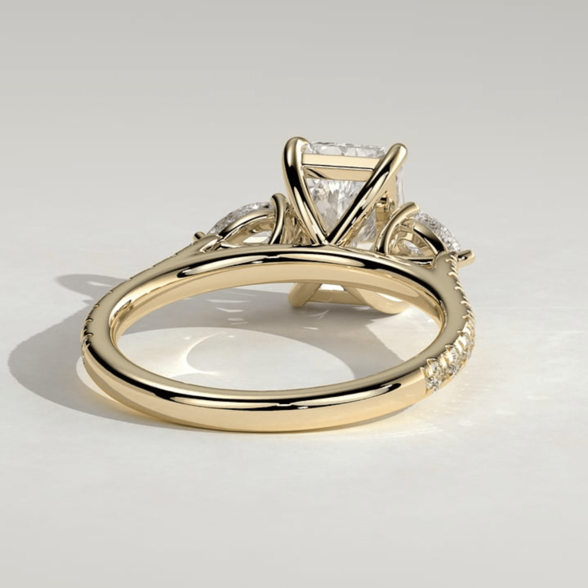 2.5 CT Radiant Three Stone Trilogy Moissanite Engagement Ring with Pear Side Stones & Pavé Band - Kazara Diam