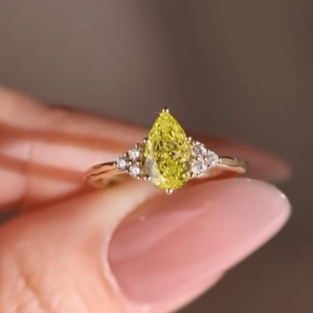 3.0CT Pear Cut Yellow Moissanite Engagement Ring with White Side Stones - Kazara Diam