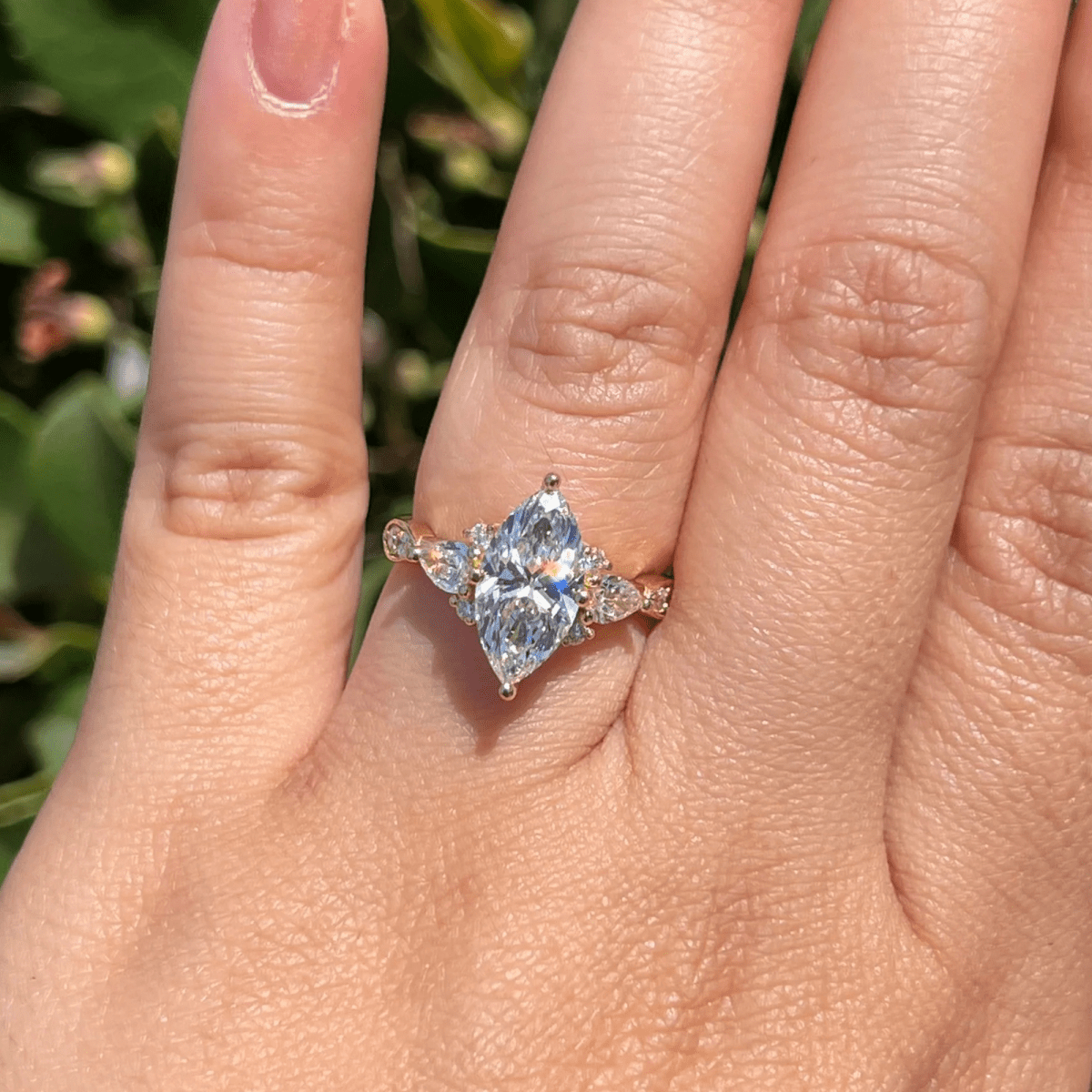 2.5 CT Marquise Cut Moissanite Three Stone Unique Engagement Ring - Kazara Diam