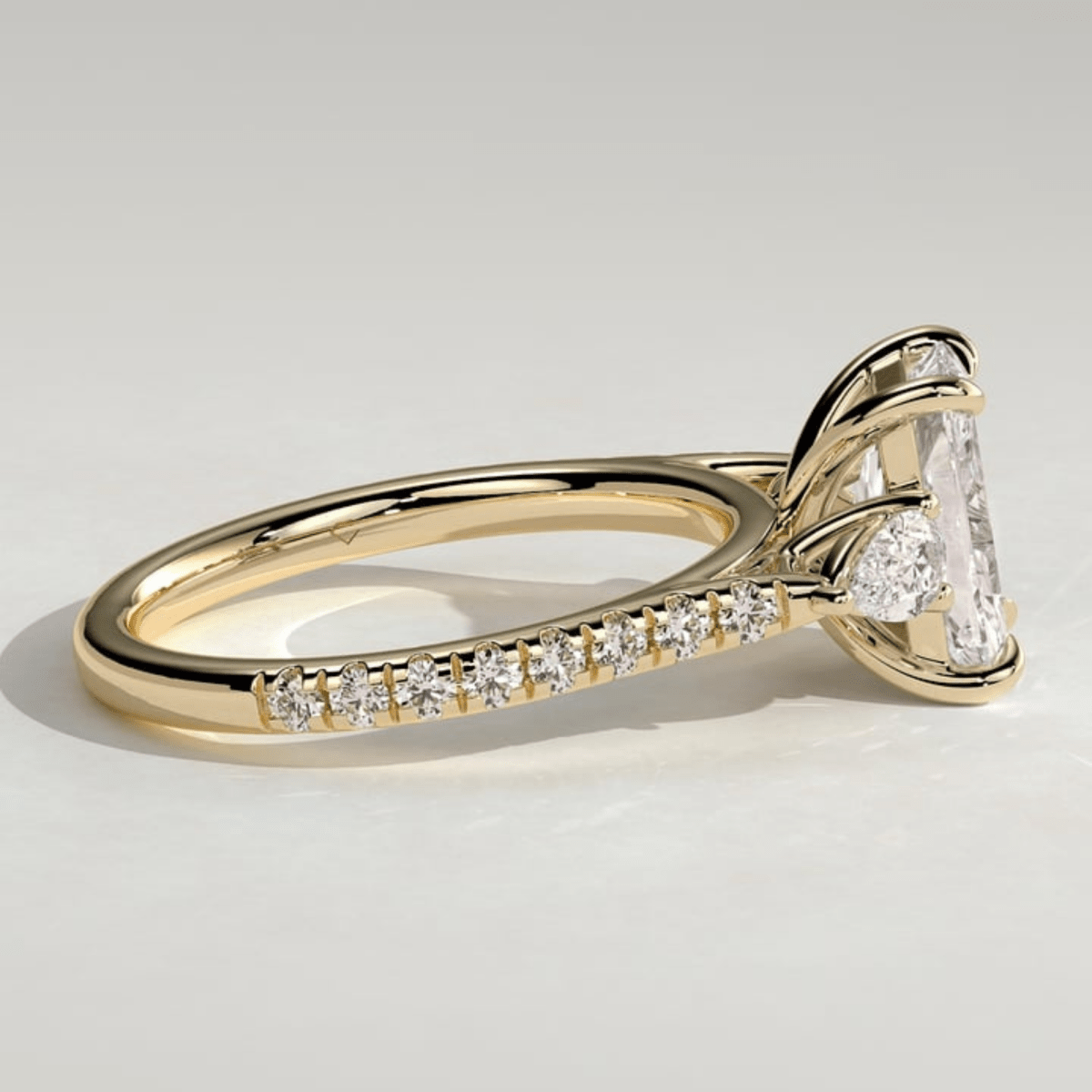 2.5 CT Radiant Three Stone Trilogy Moissanite Engagement Ring with Pear Side Stones & Pavé Band - Kazara Diam