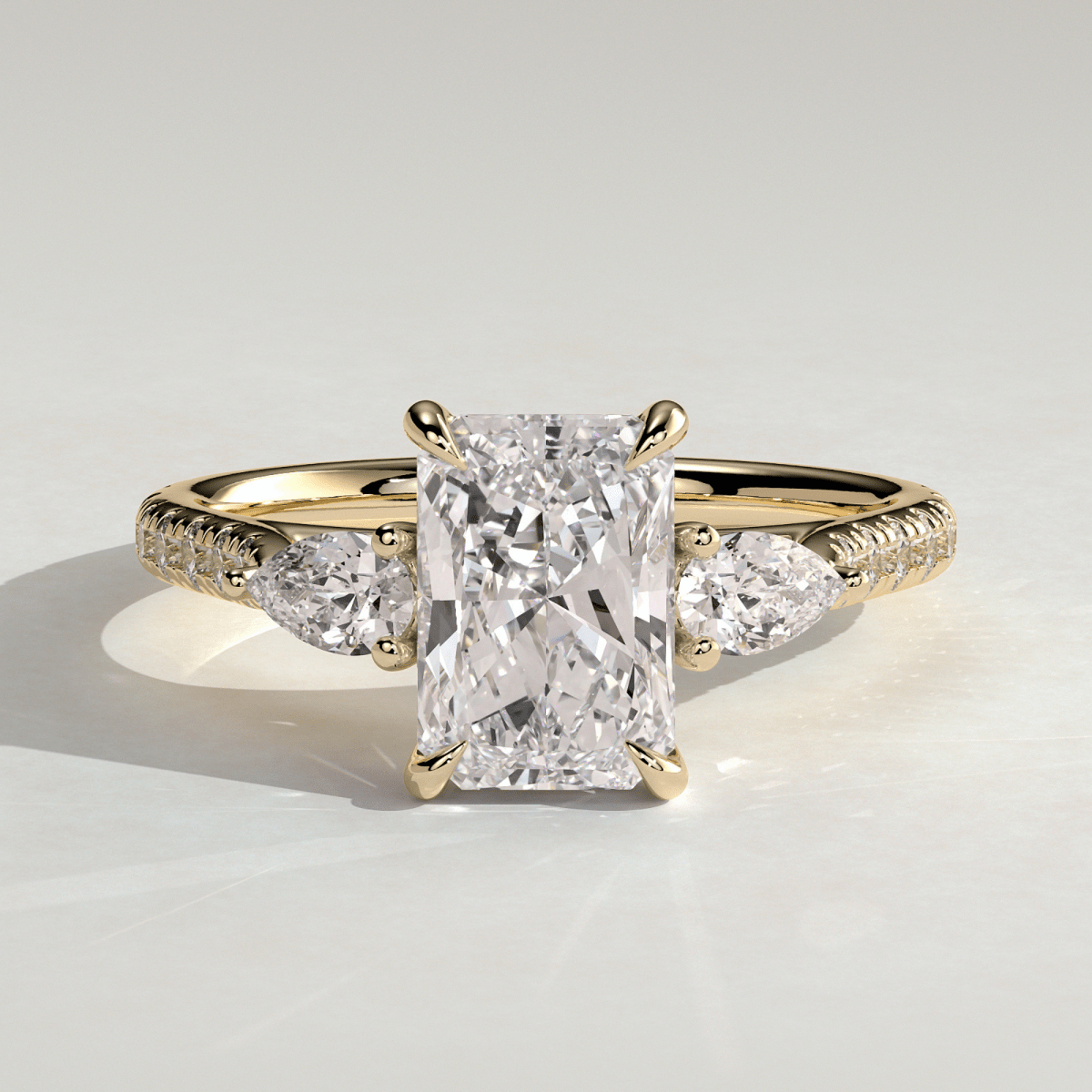 2.5 CT Radiant Three Stone Trilogy Moissanite Engagement Ring with Pear Side Stones & Pavé Band - Kazara Diam
