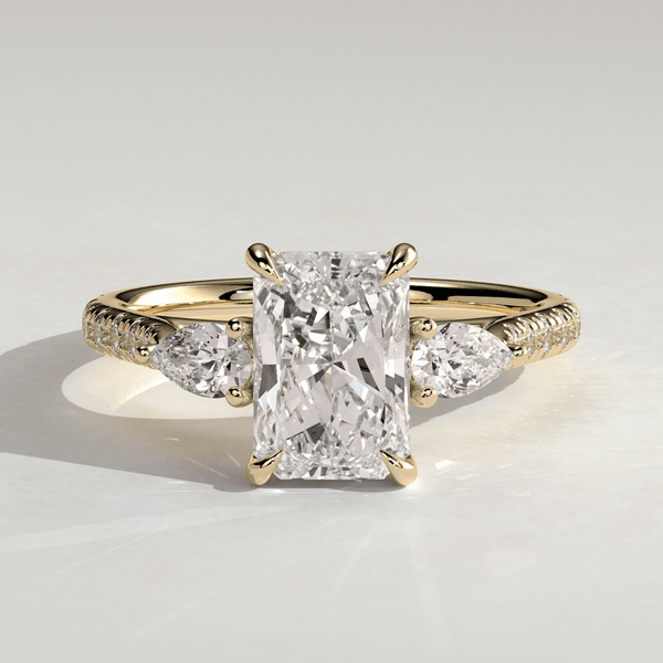 2.5 CT Radiant Cut Lab Grown Diamond Trilogy Ring with Pear Side Stones & Pavé Band
