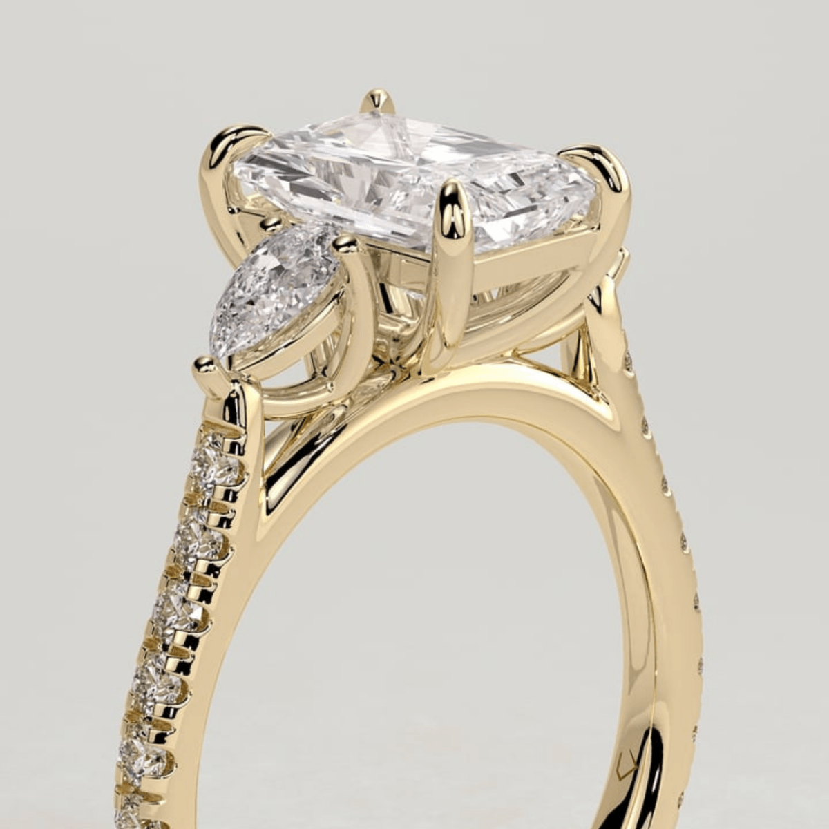 2.5 CT Radiant Three Stone Trilogy Moissanite Engagement Ring with Pear Side Stones & Pavé Band - Kazara Diam