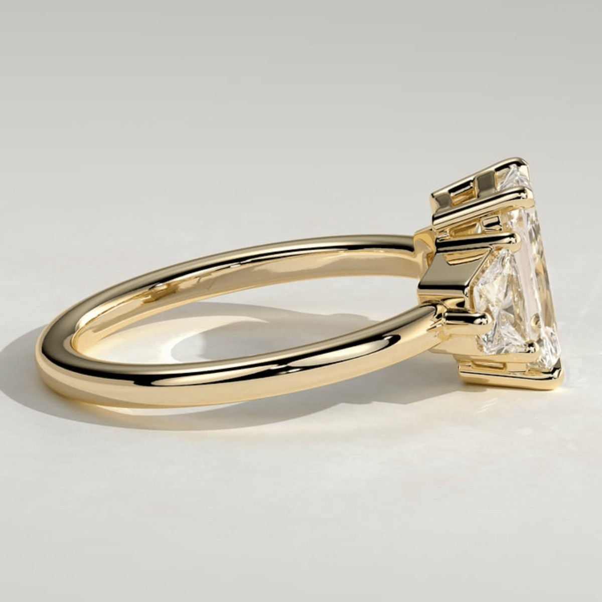 2.50 CT Radiant 4-Claw Trilogy Moissanite Engagement Ring with Trapezoid Side Stones - Kazara Diam