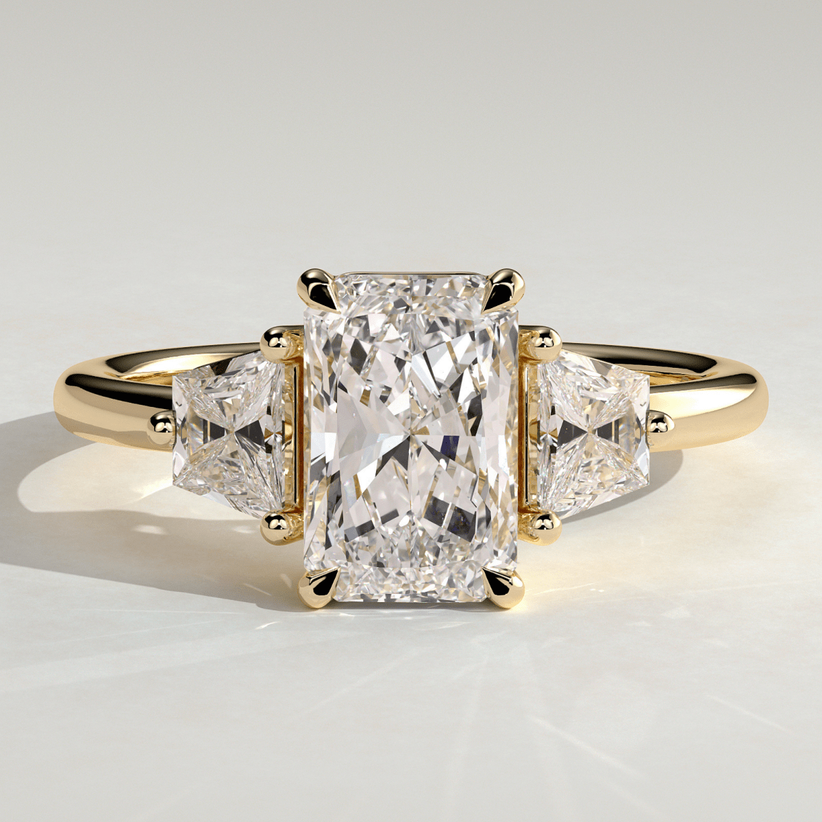 2.50 CT Radiant 4-Claw Trilogy Moissanite Engagement Ring with Trapezoid Side Stones - Kazara Diam