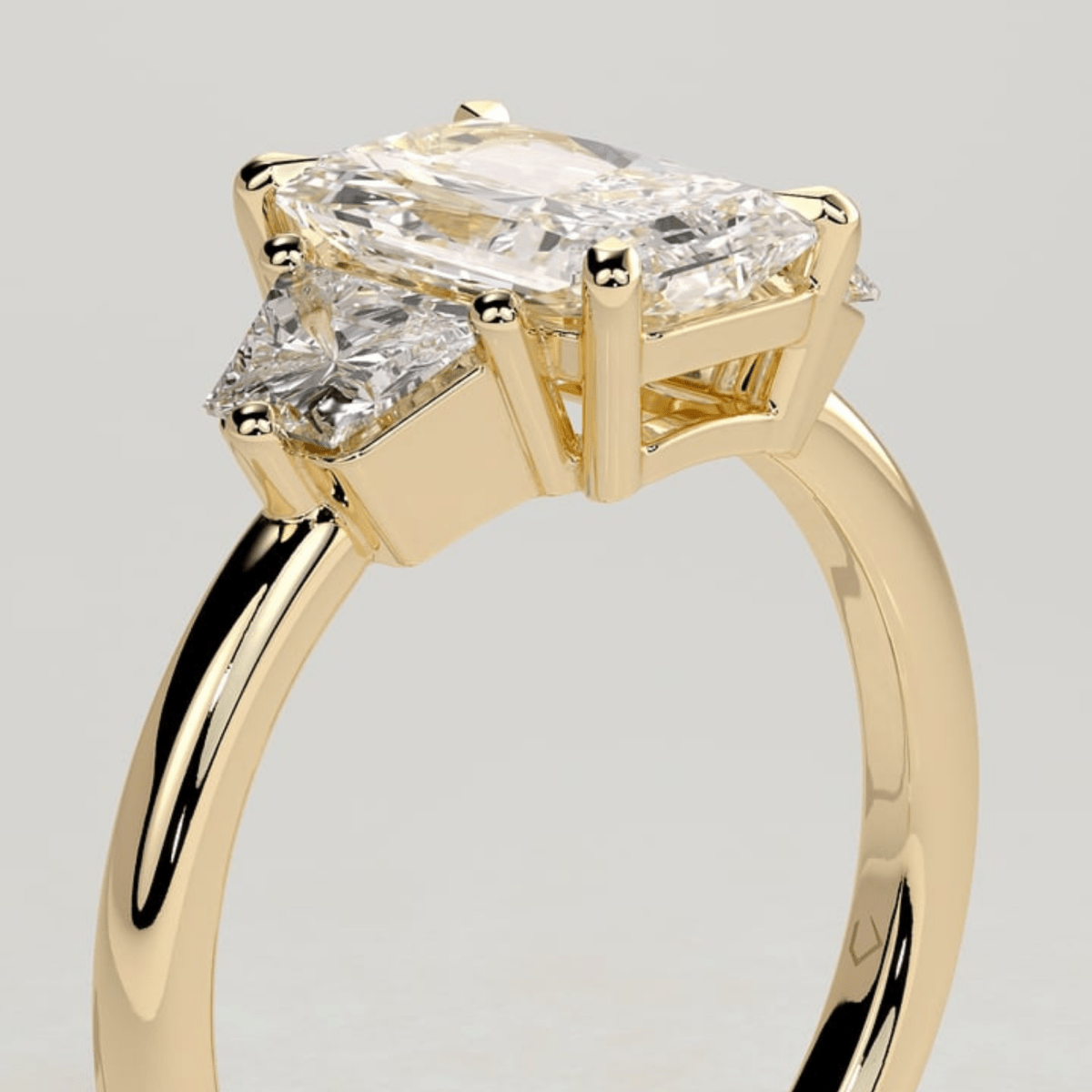 2.50 CT Radiant 4-Claw Trilogy Moissanite Engagement Ring with Trapezoid Side Stones - Kazara Diam
