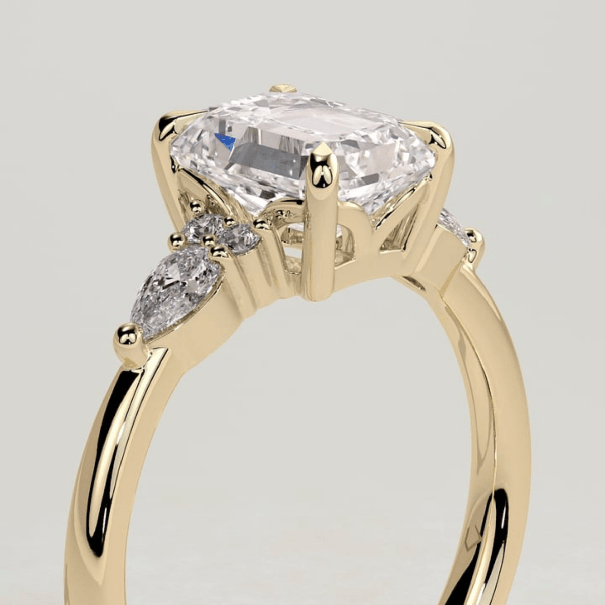 2.5CT Emerald 4 Claw Solitaire with Pear Accents and Moissanite Engagement Ring - Kazara Diam