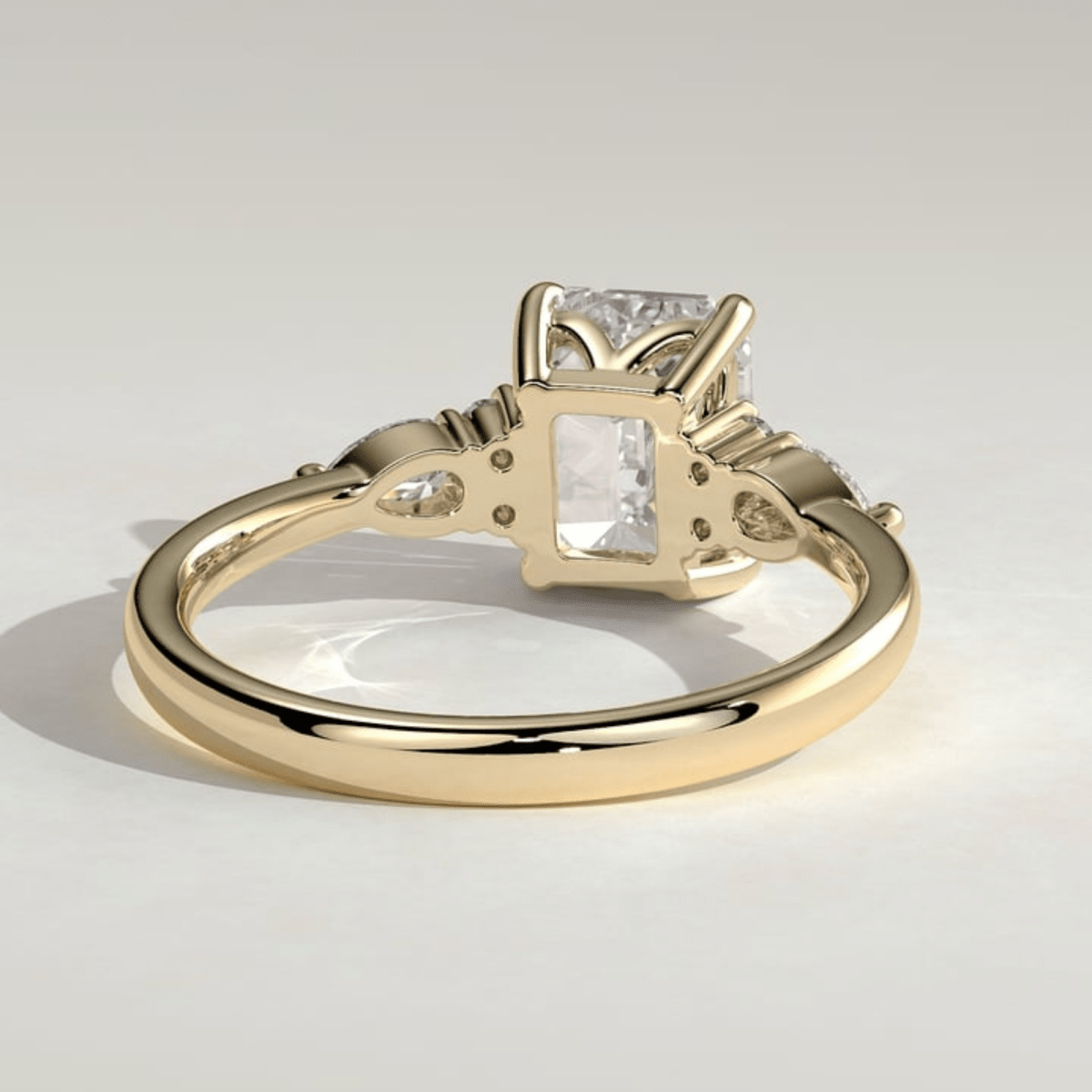 2.5CT Emerald 4 Claw Solitaire with Pear Accents and Moissanite Engagement Ring - Kazara Diam