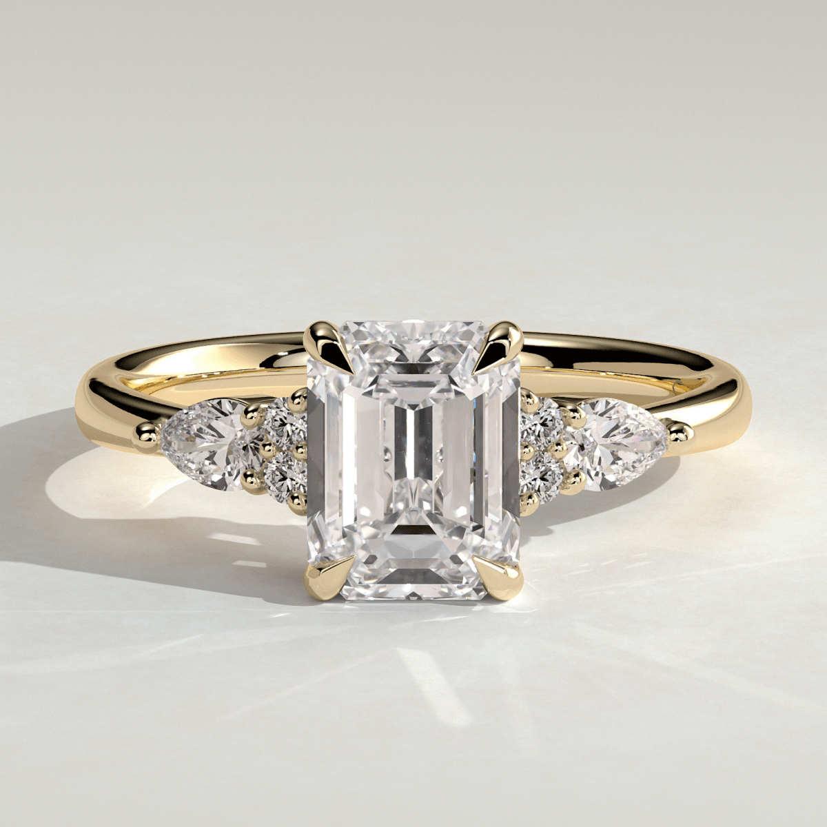2.5CT Emerald 4 Claw Solitaire with Pear Accents and Moissanite Engagement Ring - Kazara Diam