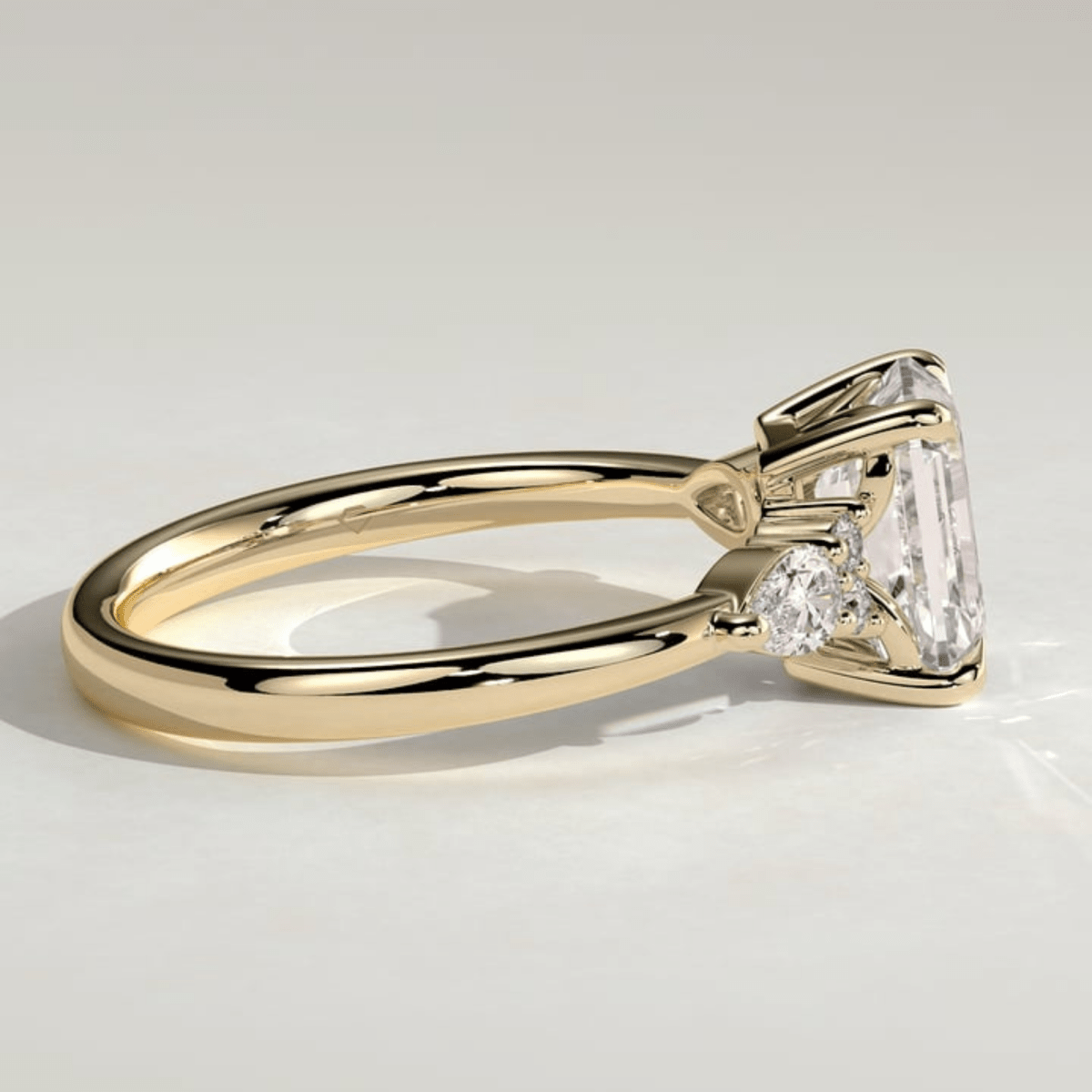 2.5CT Emerald 4 Claw Solitaire with Pear Accents and Moissanite Engagement Ring - Kazara Diam