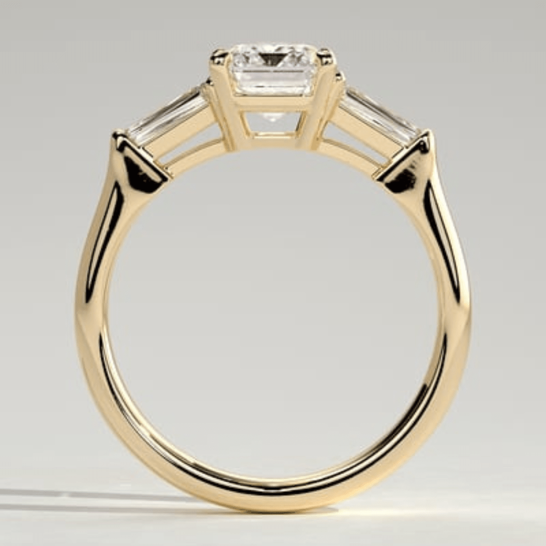3 CT Emerald Cut Moissanite 4 Claw Trilogy with Tapered Baguette Side Stones Engagement Ring - Kazara Diam