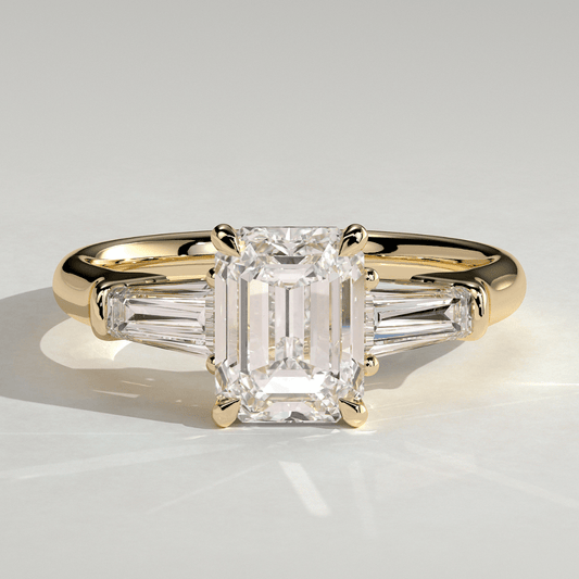 3 CT Emerald Cut Moissanite 4 Claw Trilogy with Tapered Baguette Side Stones Engagement Ring - Kazara Diam