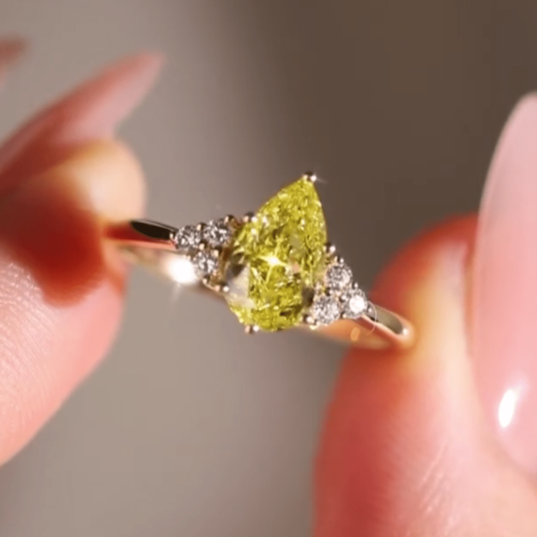 3.0CT Pear Cut Yellow Moissanite Engagement Ring with White Side Stones - Kazara Diam