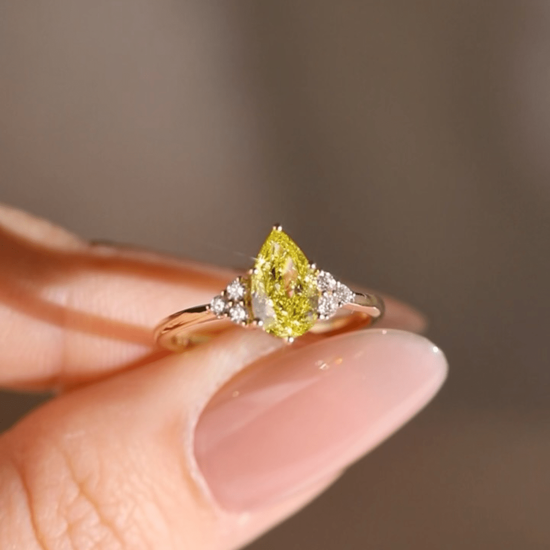 3.0CT Pear Cut Yellow Moissanite Engagement Ring with White Side Stones - Kazara Diam
