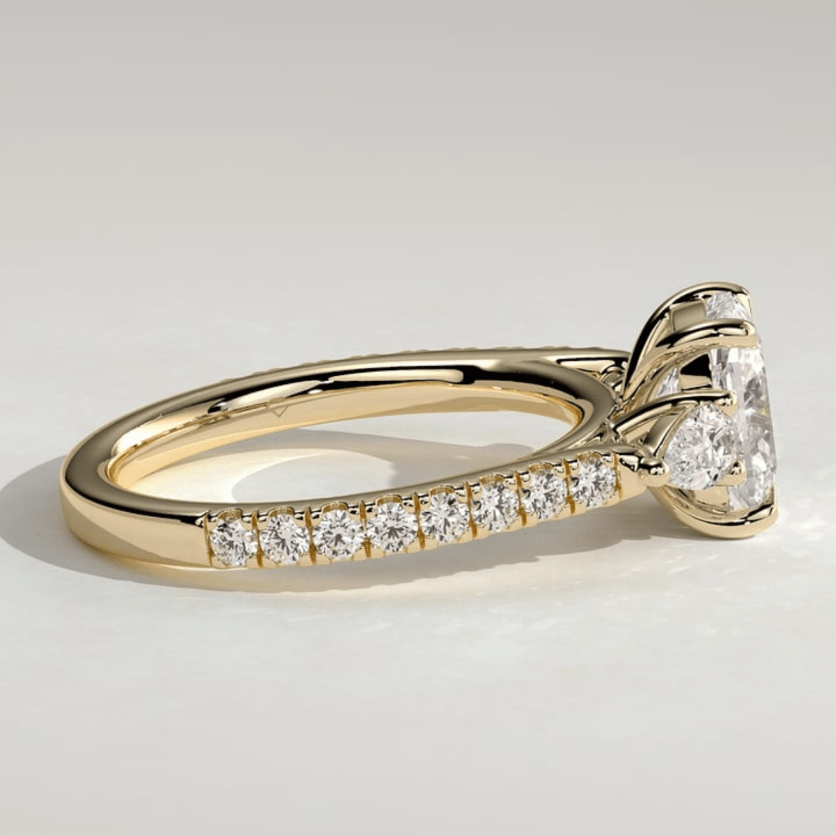 3CT Elongated Cushion 4-Claw Trilogy Moissanite Engagement Ring with Pear Side Stones & Pavé Band - Kazara Diam