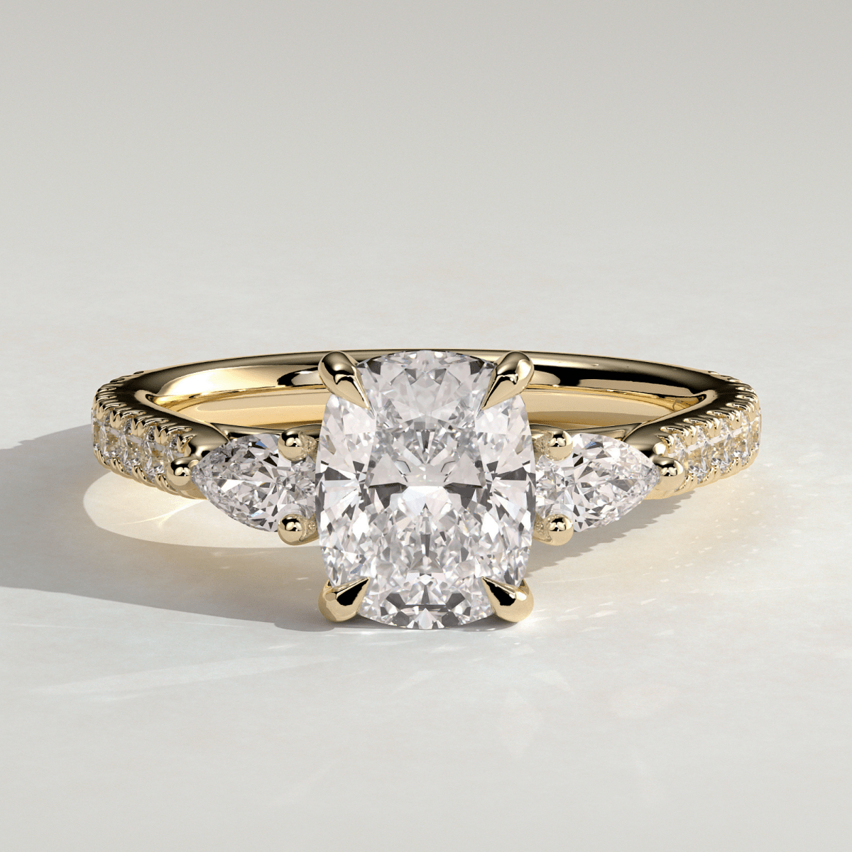 3CT Elongated Cushion 4-Claw Trilogy Moissanite Engagement Ring with Pear Side Stones & Pavé Band - Kazara Diam