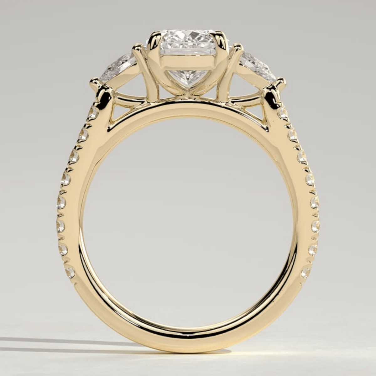 3CT Elongated Cushion 4-Claw Trilogy Moissanite Engagement Ring with Pear Side Stones & Pavé Band - Kazara Diam