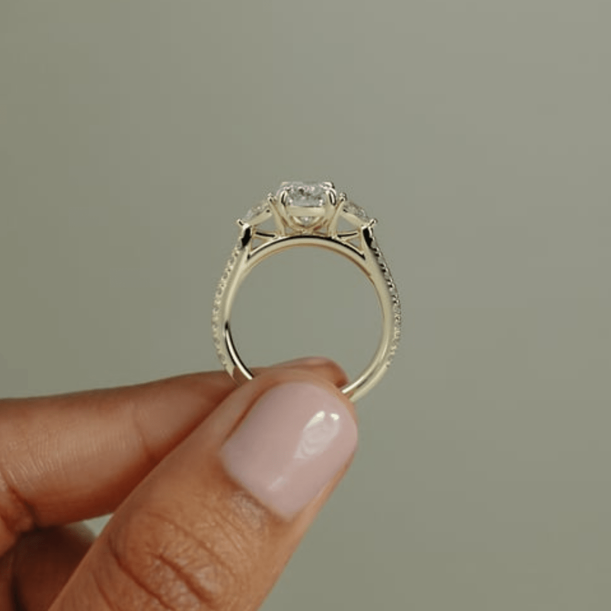 3CT Elongated Cushion 4-Claw Trilogy Moissanite Engagement Ring with Pear Side Stones & Pavé Band - Kazara Diam
