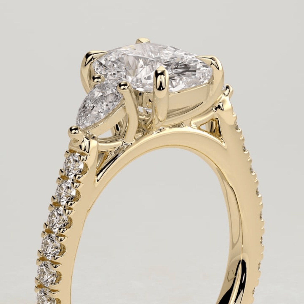 3CT Elongated Cushion 4-Claw Trilogy Moissanite Engagement Ring with Pear Side Stones & Pavé Band - Kazara Diam