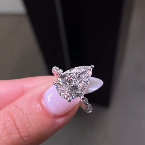 4 CT Pear Cut Lab Grown Diamond Engagement Ring on Hand